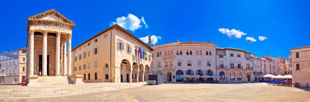 The Temple of Augustus and Town Hall or “Gradska Palača" are located in The Forum (main square) in Pula, Croatia.