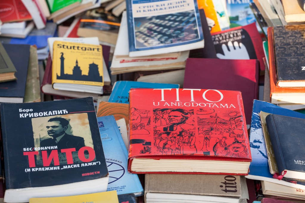 Second-hand books of Marshal Josip Broz Tito for sale at a flea market. Tito was the communist, socialist leader of Yugoslavia. He was commonly known as Tito.