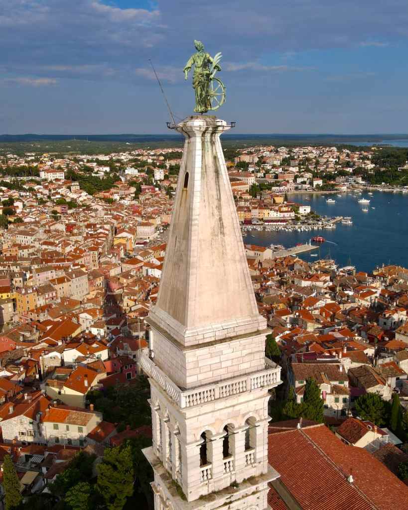 The patron Saint Euphemia sits atop Croatia's Rovinj's bell tower.